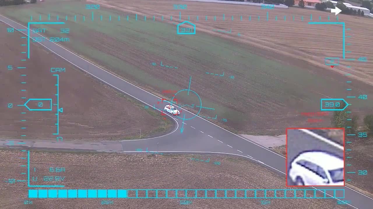 White estate through the bend — onboard AI target lock and real-time tracking from a UAV in strong crosswind, FPV goggles DVR