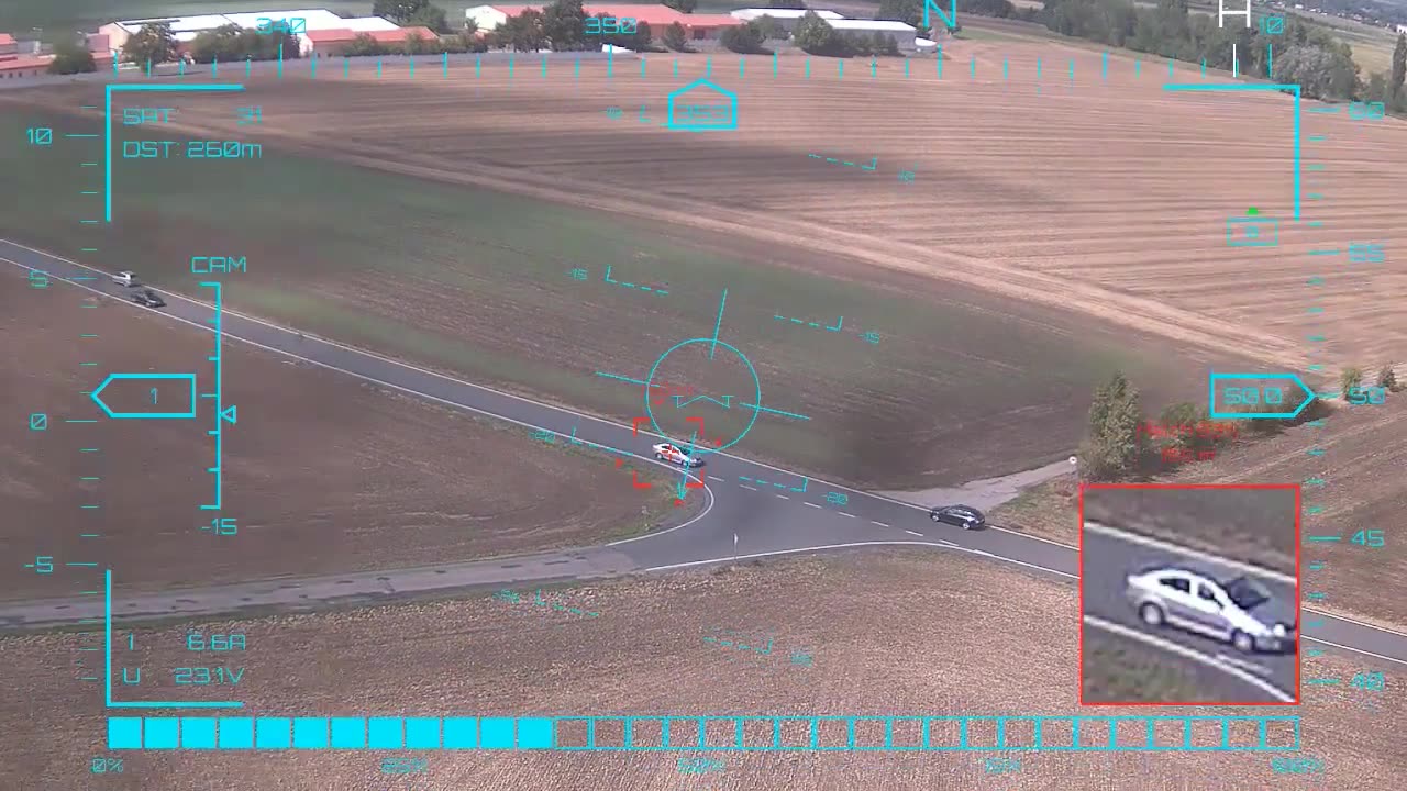 Silver sedan at 260 m — onboard AI target lock and real-time tracking from a UAV in strong crosswind, FPV goggles DVR