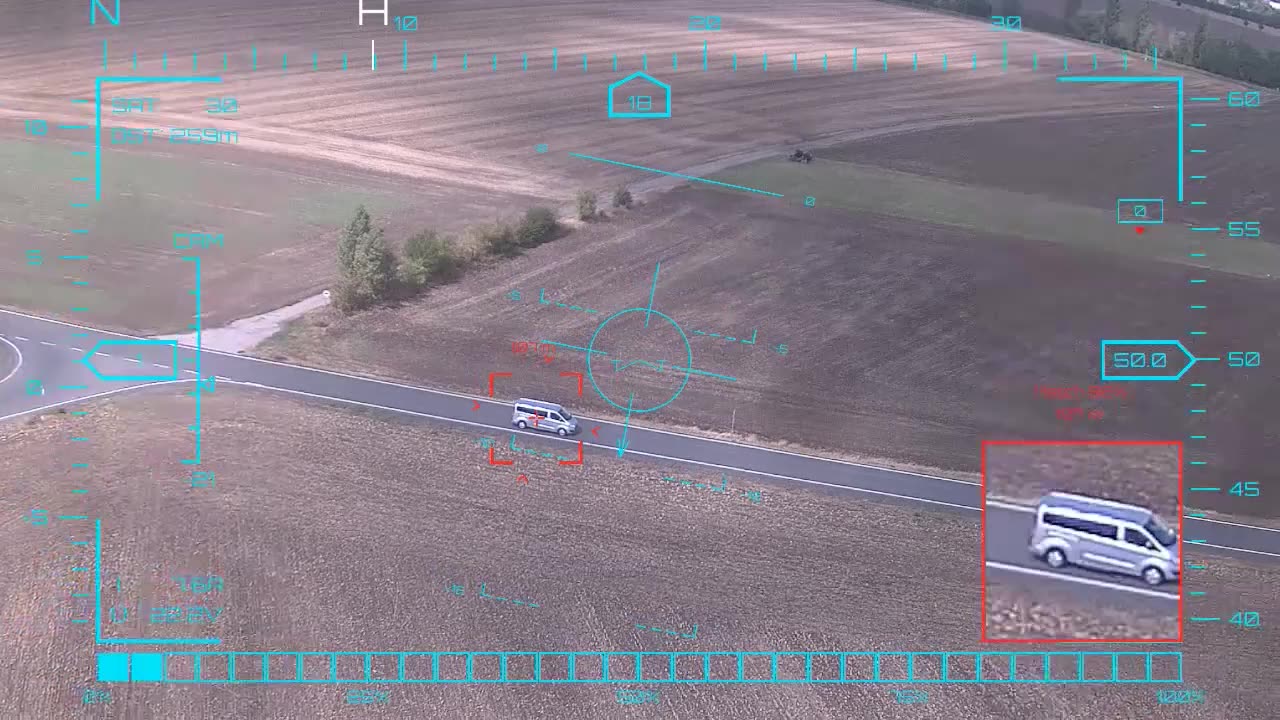 Minibus along the field road — onboard AI target lock and real-time tracking from a UAV in strong crosswind, FPV goggles DVR